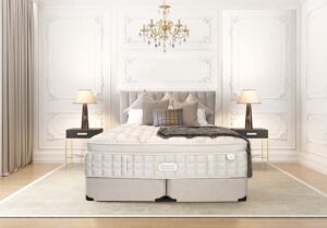Light coloured Beautyrest bed in a glamourous room.